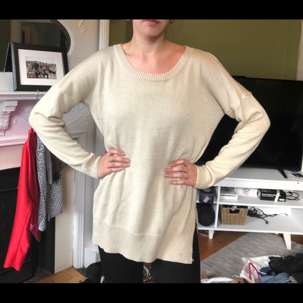 Cream sweater with back cut-outs